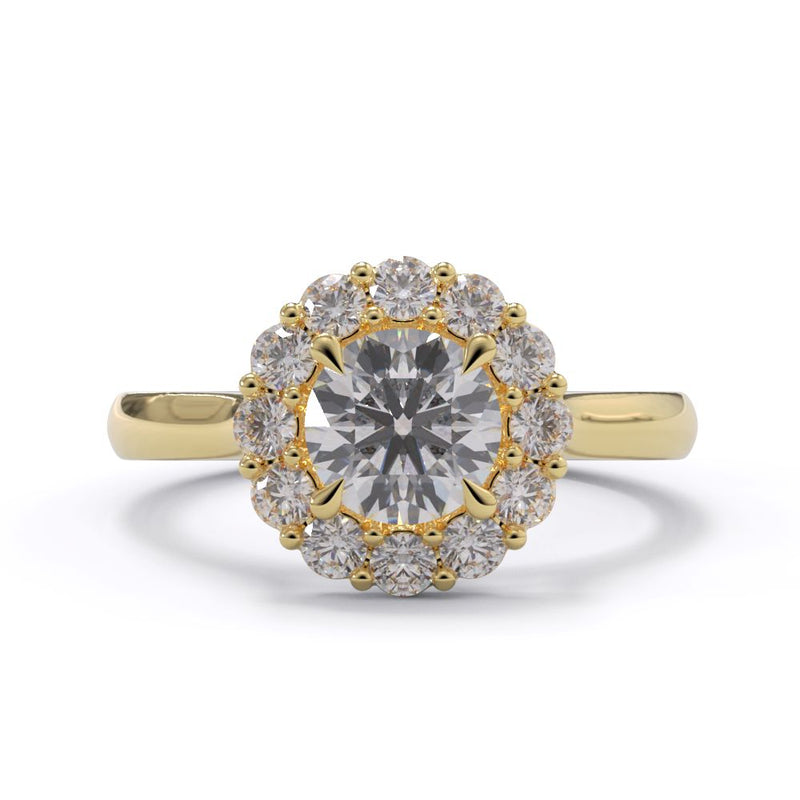Gold ring with a diamond on a white background