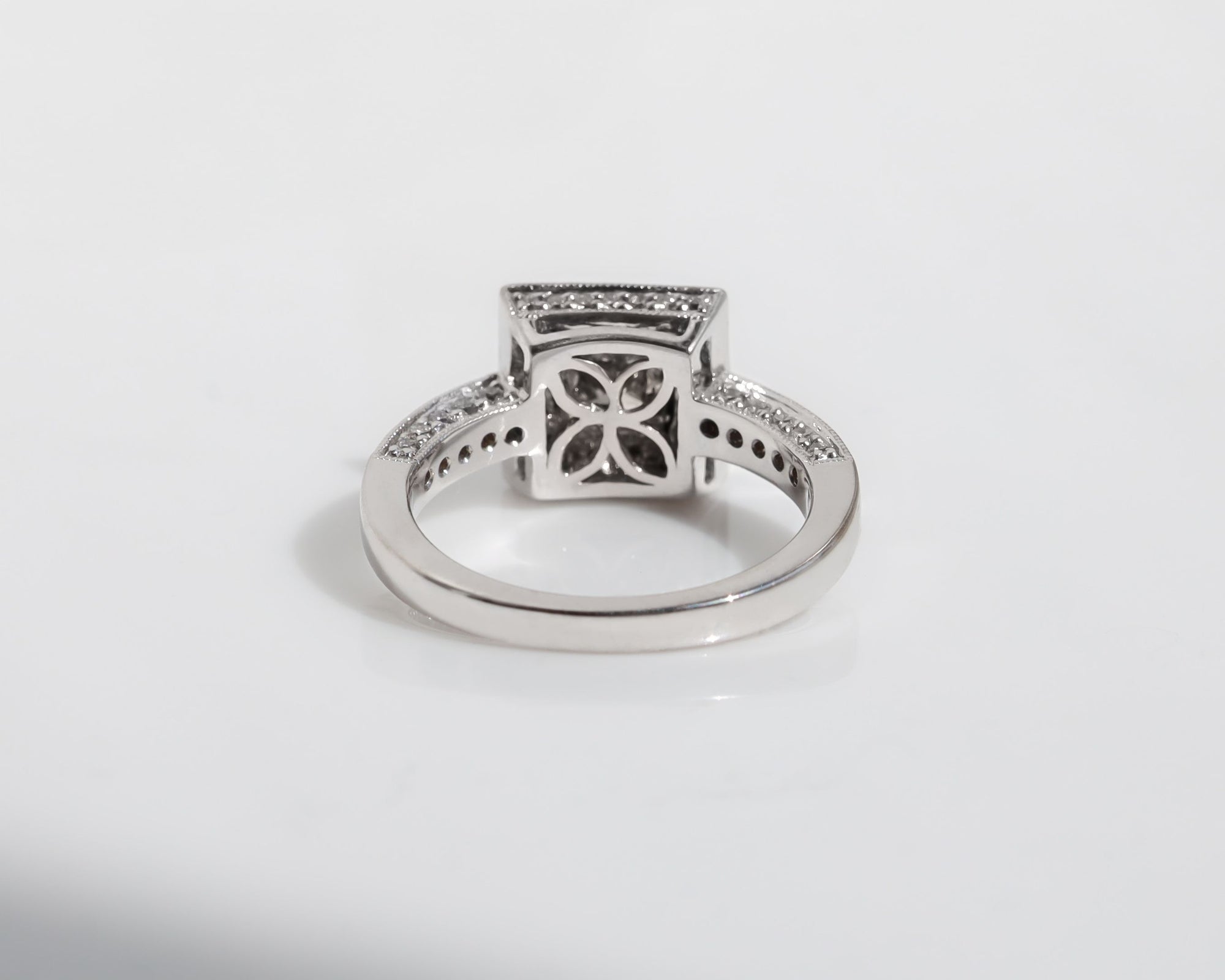 White gold ring with diamonds on a white background. Handmade in Auckland, New Zealand by NZ's best jewellers 