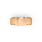 Rose-gold men's wedding ring with a brushed band on a white background. By Meaden Master Jewellers. Award-winning team of Jewellers, based in Auckland, New Zealand.