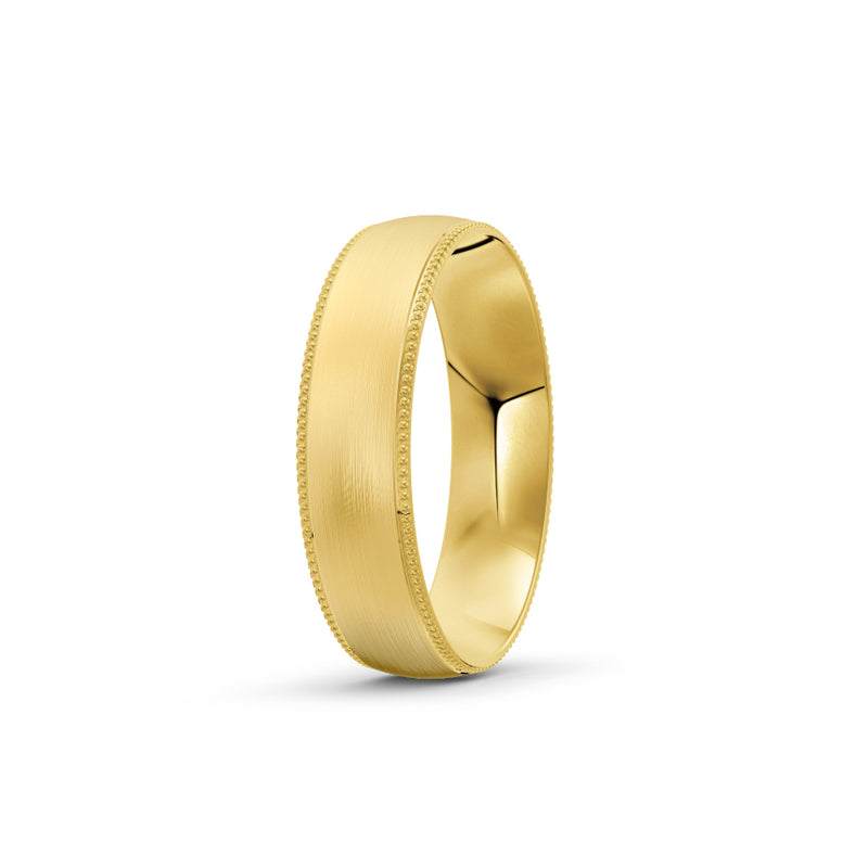 Yellow-gold men's wedding ring with a textured edge on a white background. By Meaden Master Jewellers. Award-winning team of Jewellers, based in Auckland, New Zealand.
