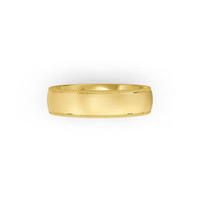 Yellow-gold men's wedding ring with a textured edge on a white background. By Meaden Master Jewellers. Award-winning team of Jewellers, based in Auckland, New Zealand.