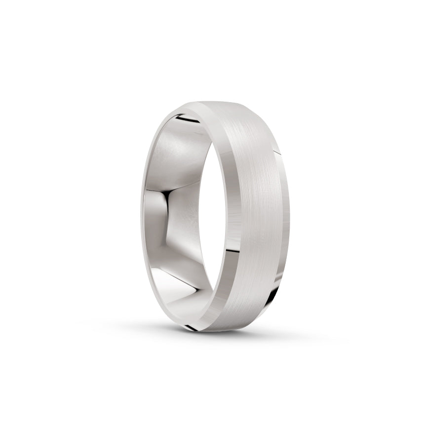 Platinum or white-gold men's wedding ring with a brushed finish on a white background. By Meaden Master Jewellers. Award-winning team of Jewellers, based in Auckland, New Zealand.