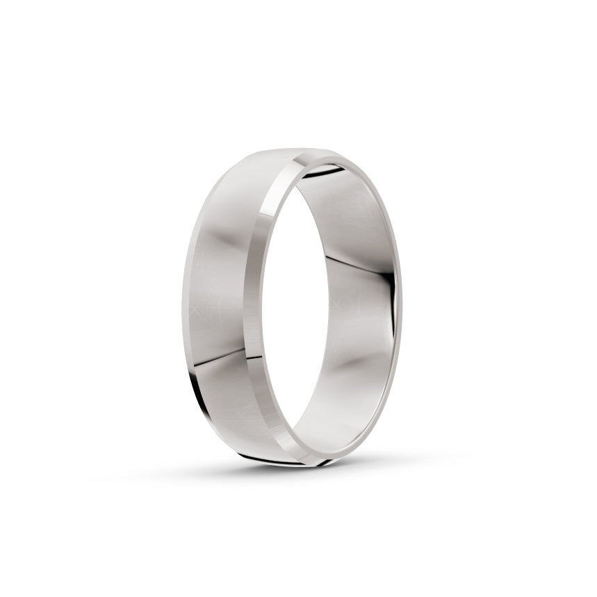 Platinum or white-gold men's wedding ring with a polished finish on a white background. By Meaden Master Jewellers. Award-winning team of Jewellers, based in Auckland, New Zealand.