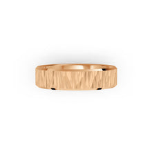 Rose gold men's wedding ring with a textured band on a white background. By Meaden Master Jewellers. Award-winning team of Jewellers, based in Auckland, New Zealand.