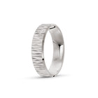 Platinum or white-gold men's wedding ring with a textured band on a white background. By Meaden Master Jewellers. Award-winning team of Jewellers, based in Auckland, New Zealand.
