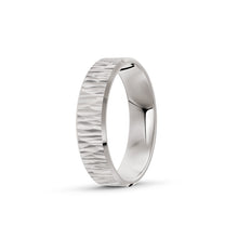 Platinum or white-gold men's wedding ring with a textured band on a white background. By Meaden Master Jewellers. Award-winning team of Jewellers, based in Auckland, New Zealand.