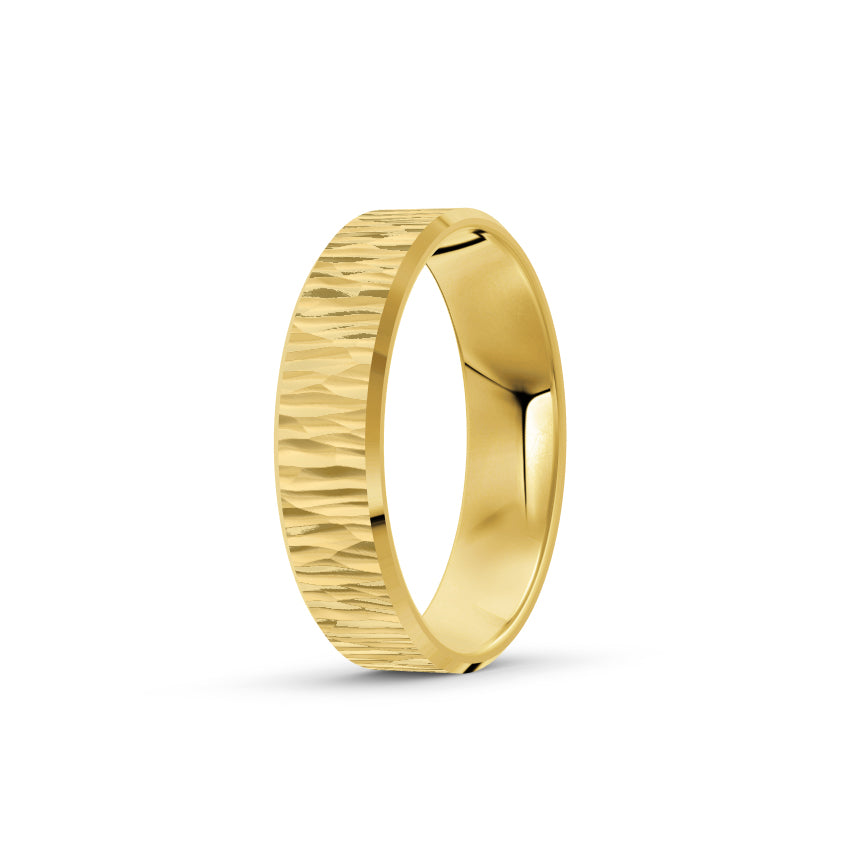 Yellow gold men's wedding ring with a textured band on a white background. By Meaden Master Jewellers. Award-winning team of Jewellers, based in Auckland, New Zealand.