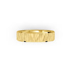 Yellow gold men's wedding ring with a textured band on a white background. By Meaden Master Jewellers. Award-winning team of Jewellers, based in Auckland, New Zealand.