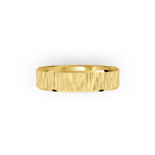 Yellow gold men's wedding ring with a textured band on a white background. By Meaden Master Jewellers. Award-winning team of Jewellers, based in Auckland, New Zealand.