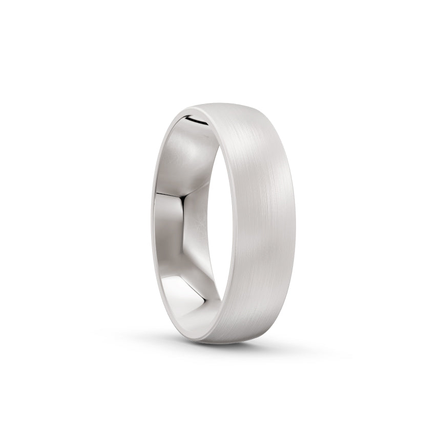 Platinum or white-gold men's wedding ring with a brushed finish on a white background. By Meaden Master Jewellers. Award-winning team of Jewellers, based in Auckland, New Zealand.