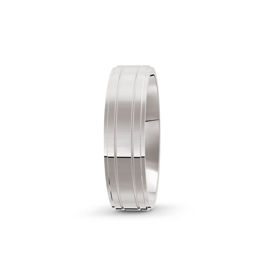 White-gold or platinum wedding band, by Meaden Master Jewellers. Two groves down the side of the wedding ring. Award-winning team of Jewellers, based in Auckland, New Zealand.