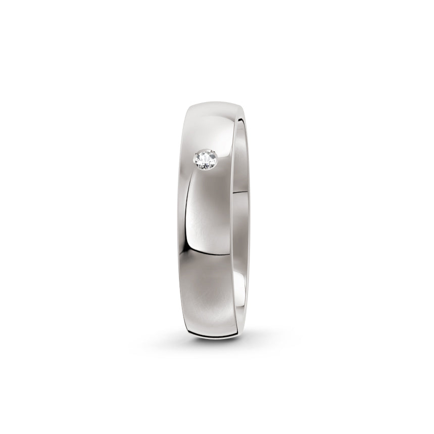 White-gold or platinum wedding ring with small diamond, by Meaden Master Jewellers. Award-winning team of Jewellers, based in Auckland, New Zealand.
