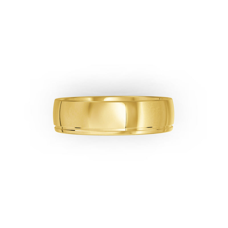 Yellow Gold ring on a white background 