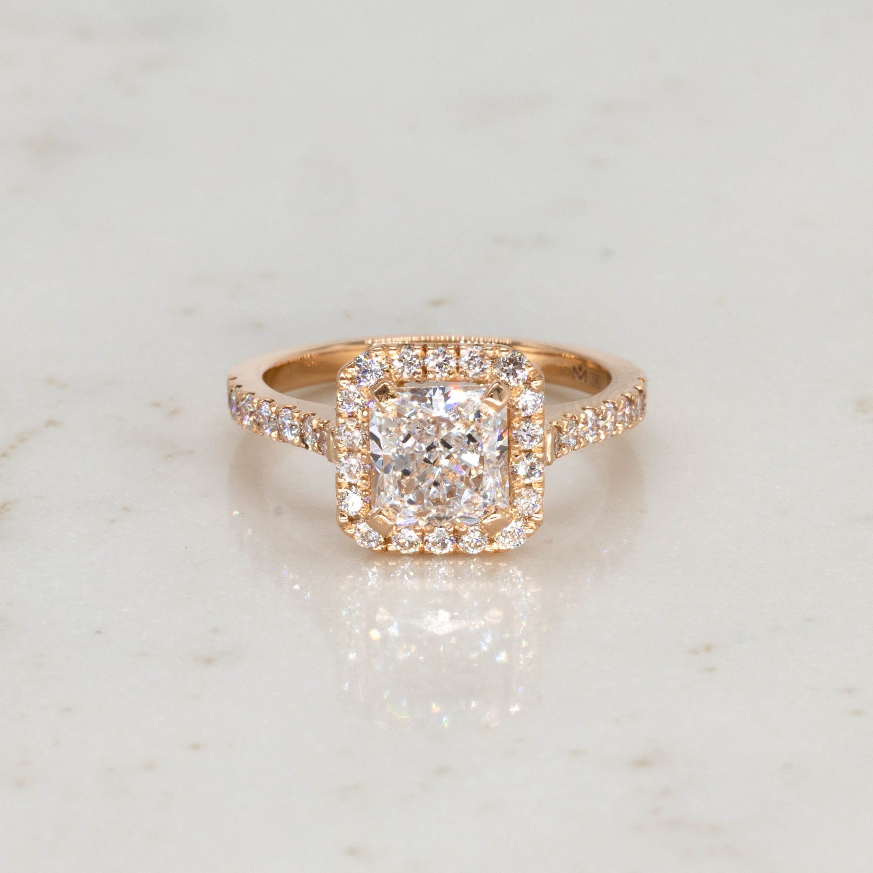 Radiant Cut Diamond Engagement Ring is a modern take on a classic Halo Design. Handmade in Auckland