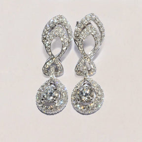 Diamond drop earrings handcrafted by Meaden Master Jewellers