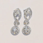 Conflict free Diamond dress earrings made by Master Jeweller