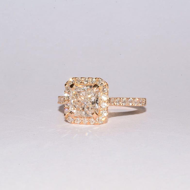 Square Diamond Engagement Ring surround by Diamonds made locally