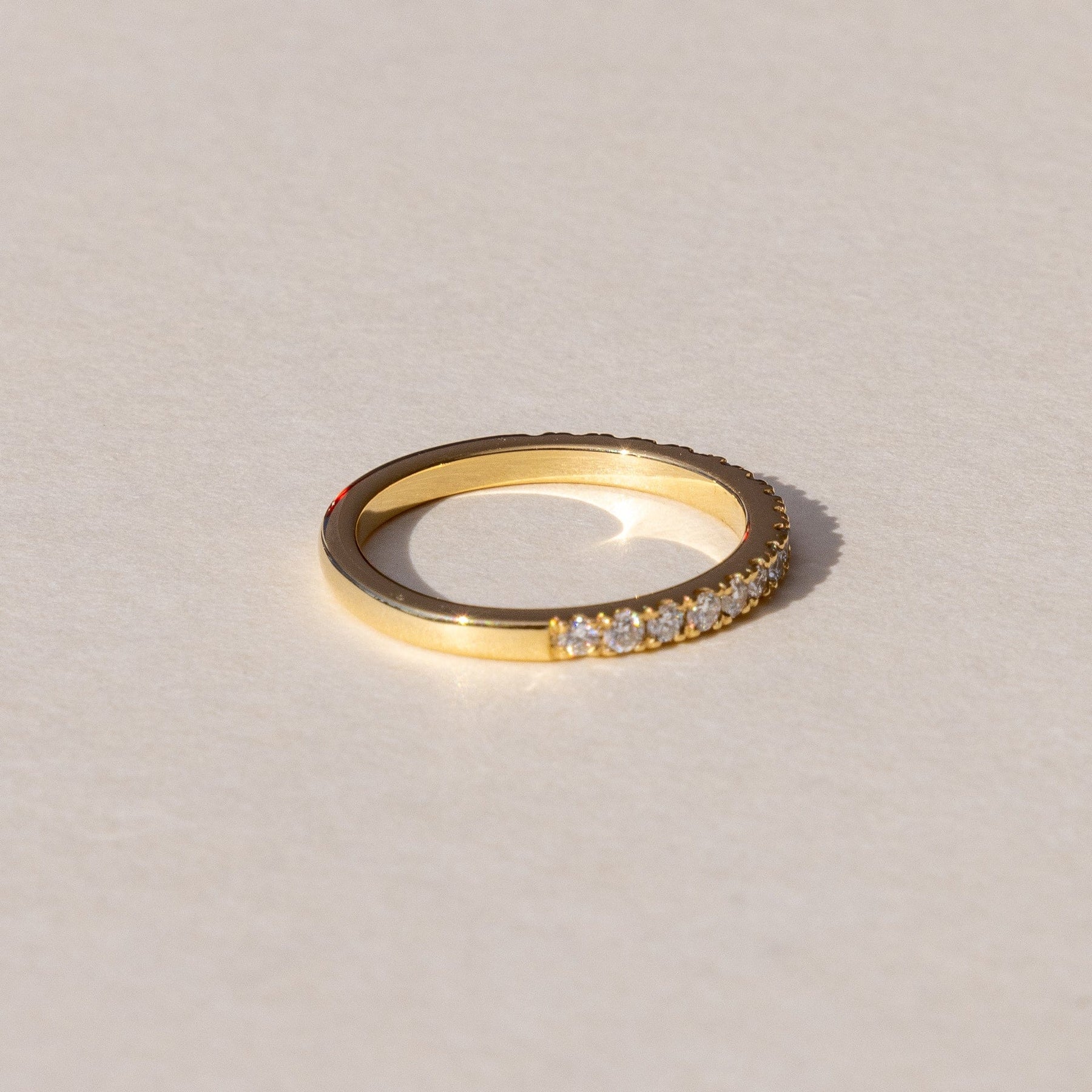 Bespoke half eternity diamond ring