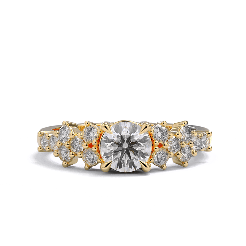 A yellow gold engagement engagement ring with a round diamond center stone and clusters of round diamonds on each side. Pave diamonds down the side of band.